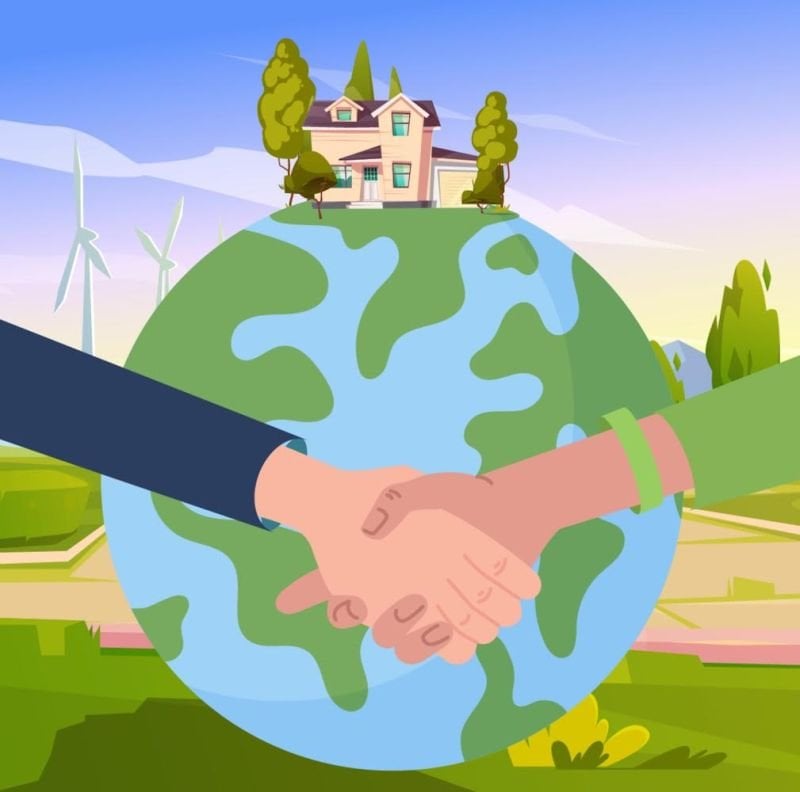 Two people shaking hands in front of a globe