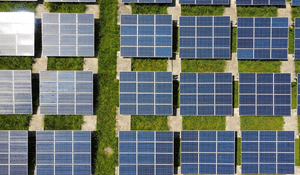 solar panels over grassy field