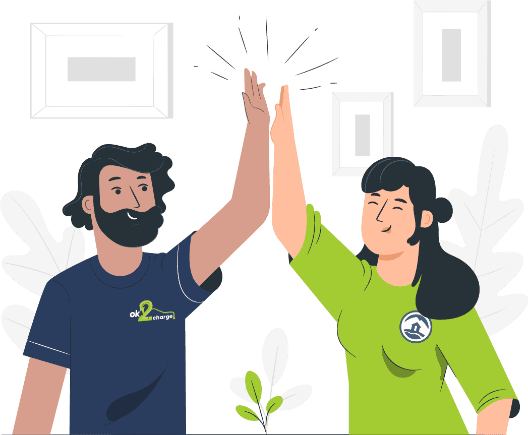 A man with a navy shirt high fives a woman with a green shirt